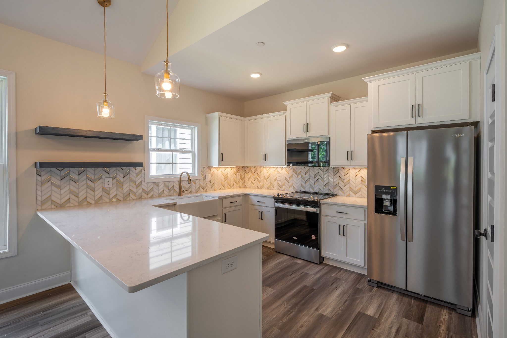 579 Centre Street Pleasant View, TN 37146 - Photo 10 of 36 a kitchen with a sink stainless steel appliances and window