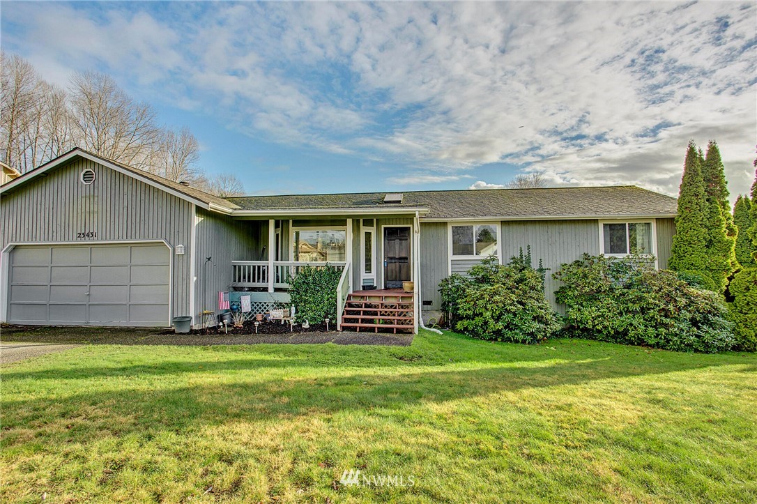 23431 12th Place West Bothell, WA 98021 - Photo 1 of 26 a view of a house with a yard and pathway