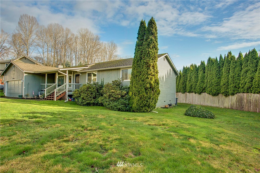 23431 12th Place West Bothell, WA 98021 - Photo 2 of 26 a view of a house with a yard and plants