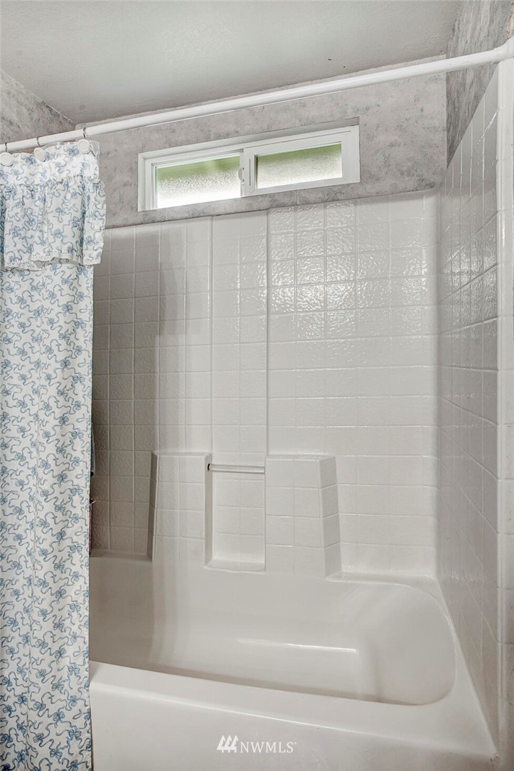 23431 12th Place West Bothell, WA 98021 - Photo 18 of 26 a bathroom with a shower