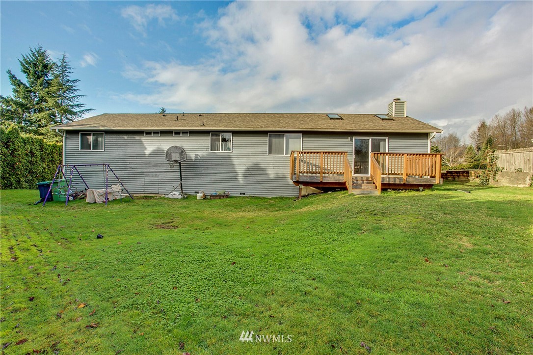 23431 12th Place West Bothell, WA 98021 - Photo 23 of 26 a view of a house with a big yard and large trees