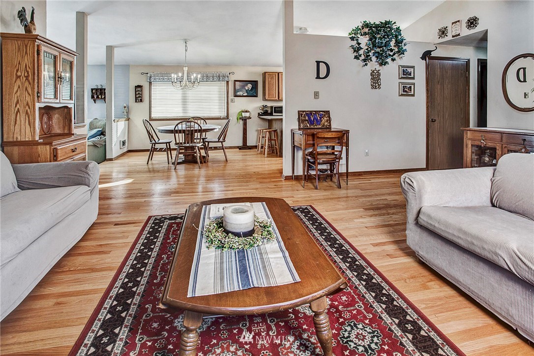 23431 12th Place West Bothell, WA 98021 - Photo 4 of 26 a living room with furniture and a rug