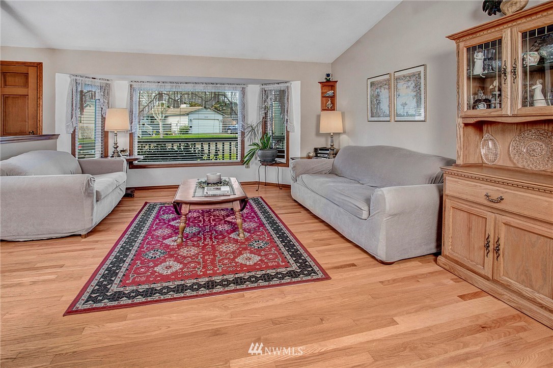 23431 12th Place West Bothell, WA 98021 - Photo 6 of 26 a living room with furniture rug and window
