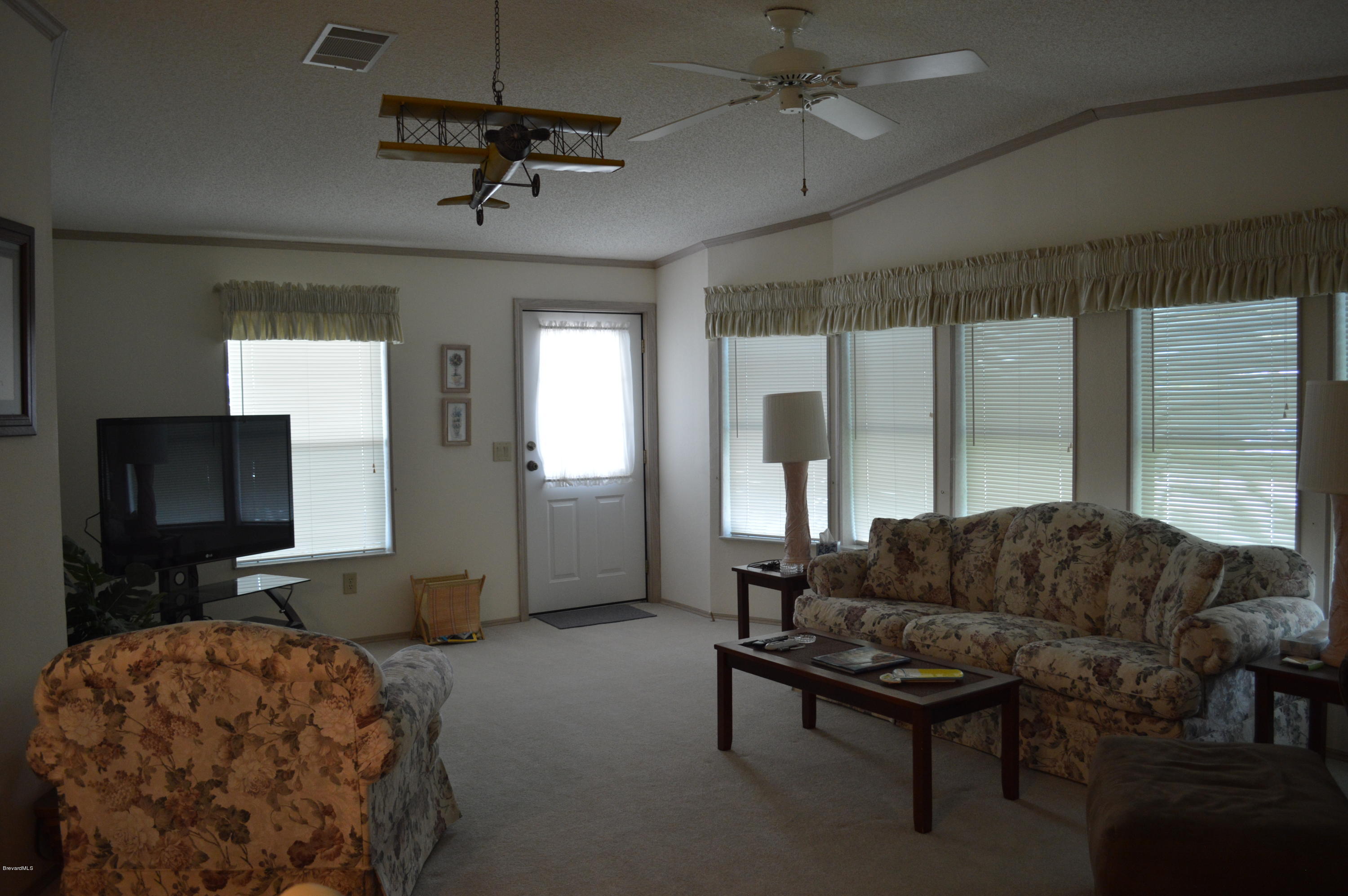 1048 Sebastian Road Barefoot Bay, FL 32976 - Photo 3 of 19 Living