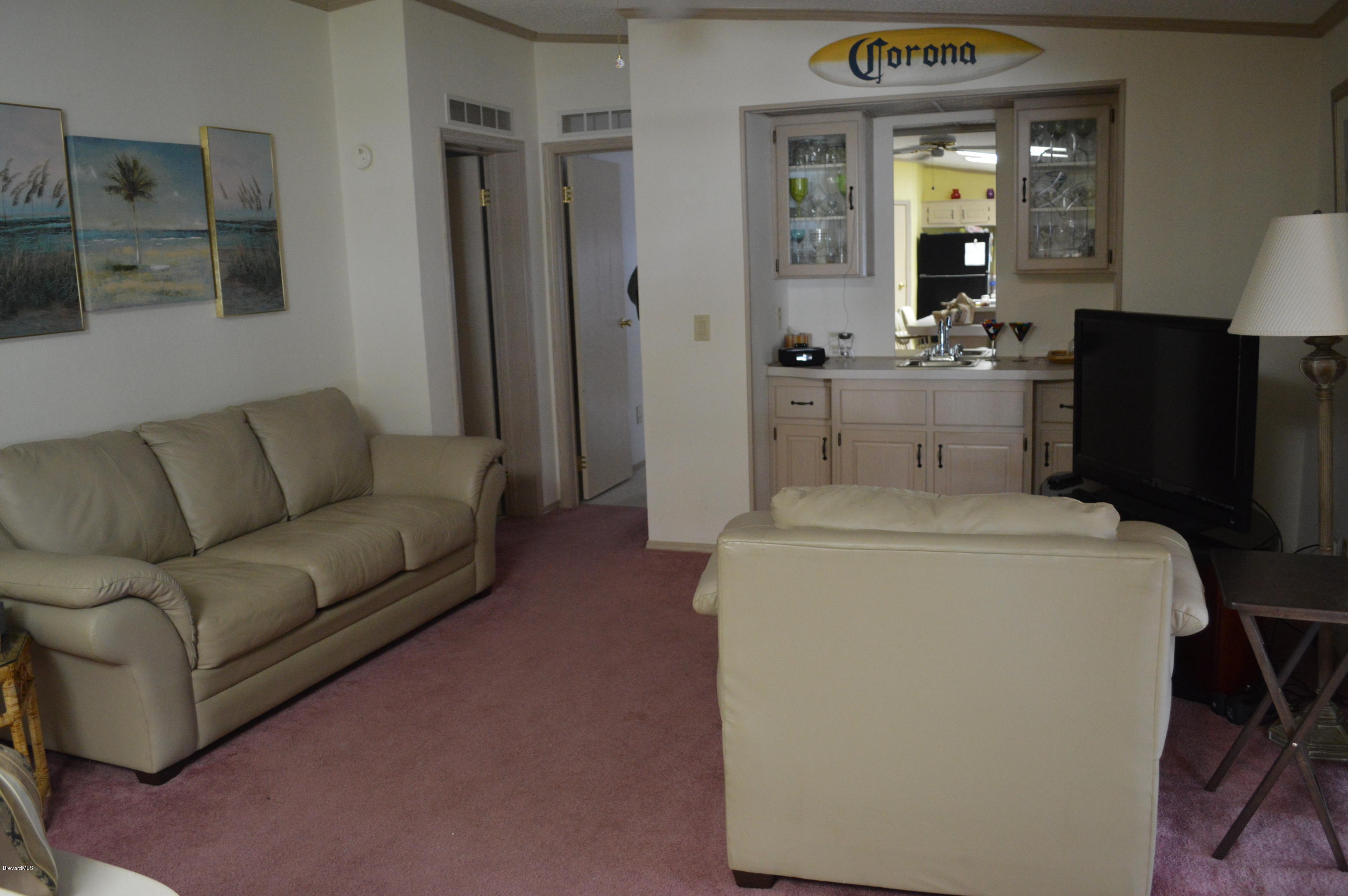 1048 Sebastian Road Barefoot Bay, FL 32976 - Photo 5 of 19 Living (3)