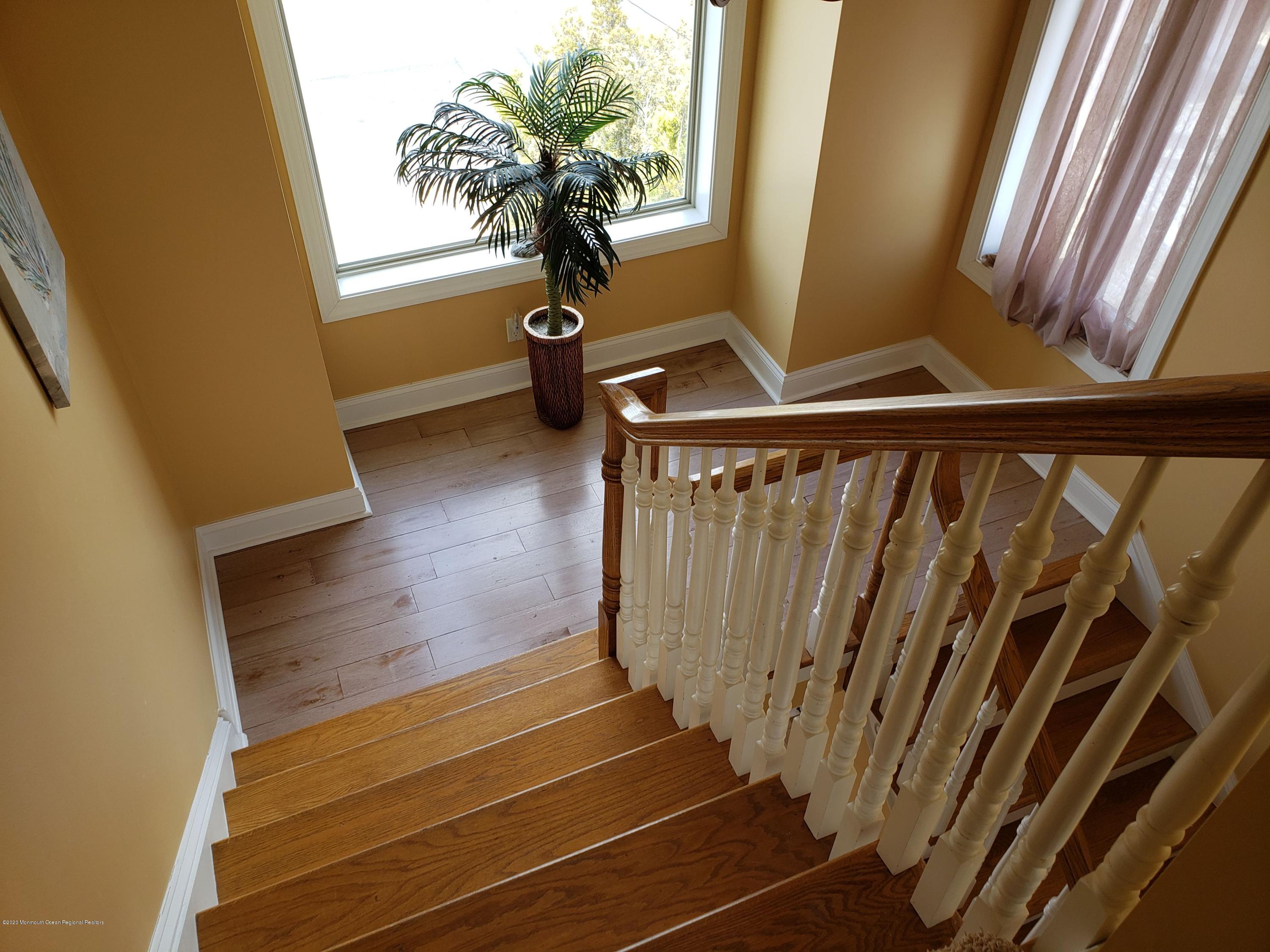 214 Heron Road Tuckerton, NJ 08087 - Photo 15 of 31 a view of entryway with wooden floor