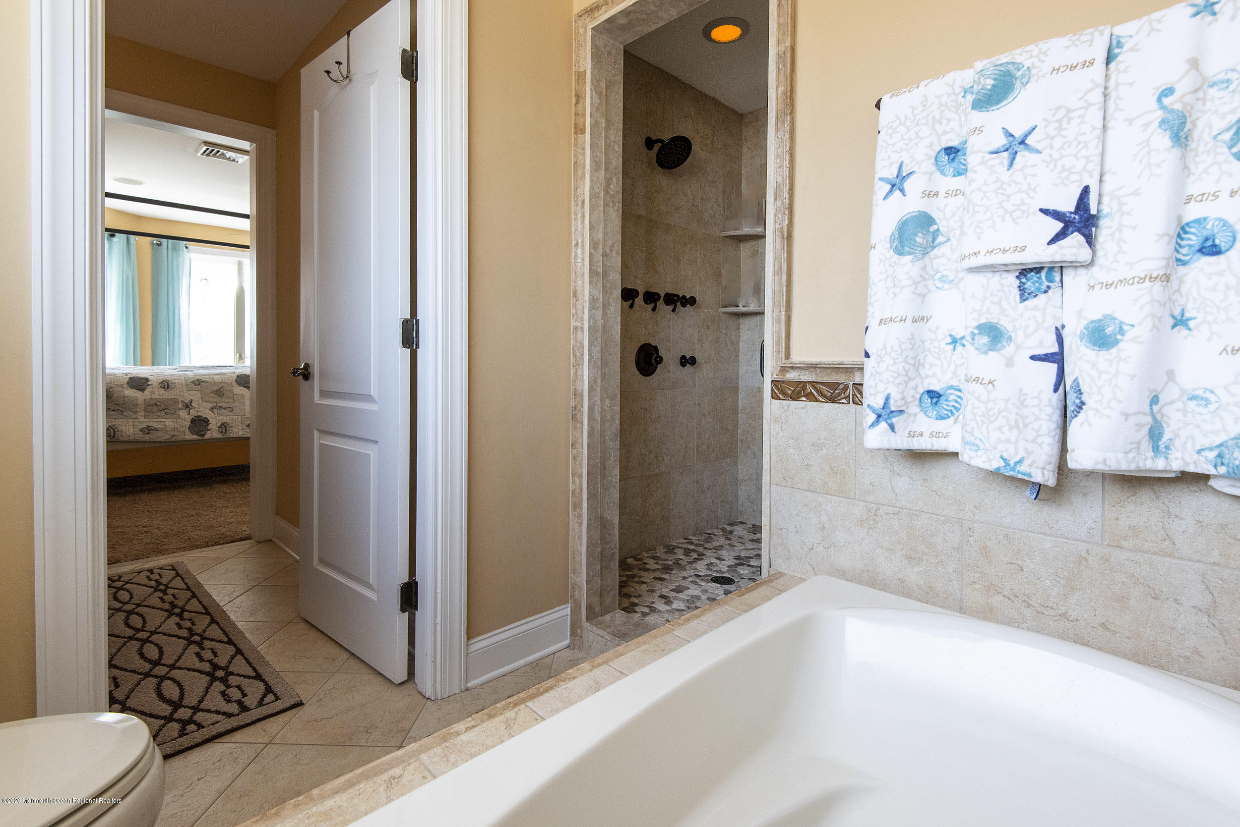 214 Heron Road Tuckerton, NJ 08087 - Photo 23 of 31 a bathroom with a shower and a sink