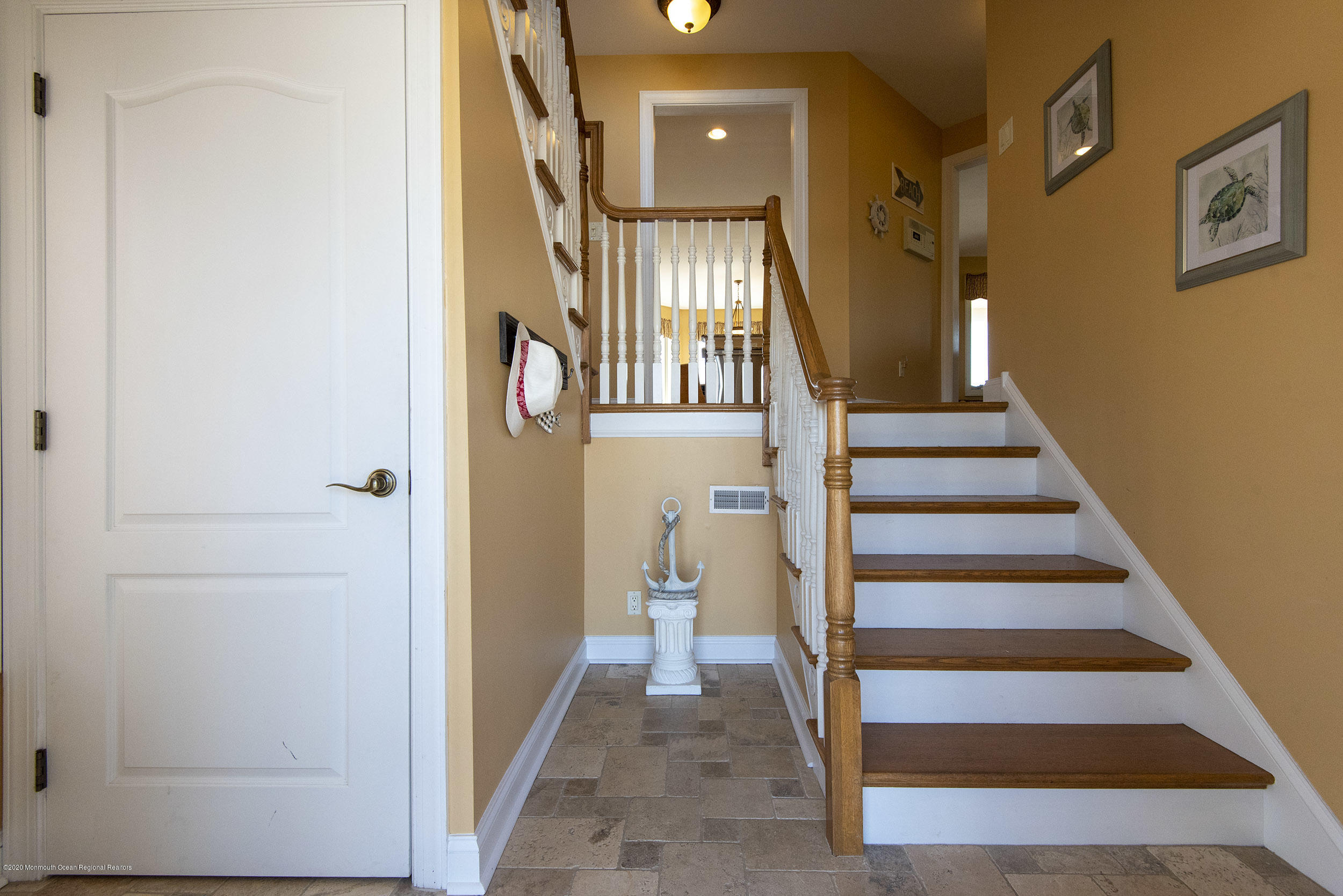 214 Heron Road Tuckerton, NJ 08087 - Photo 3 of 31 a view of a hallway with wooden floor and entryway