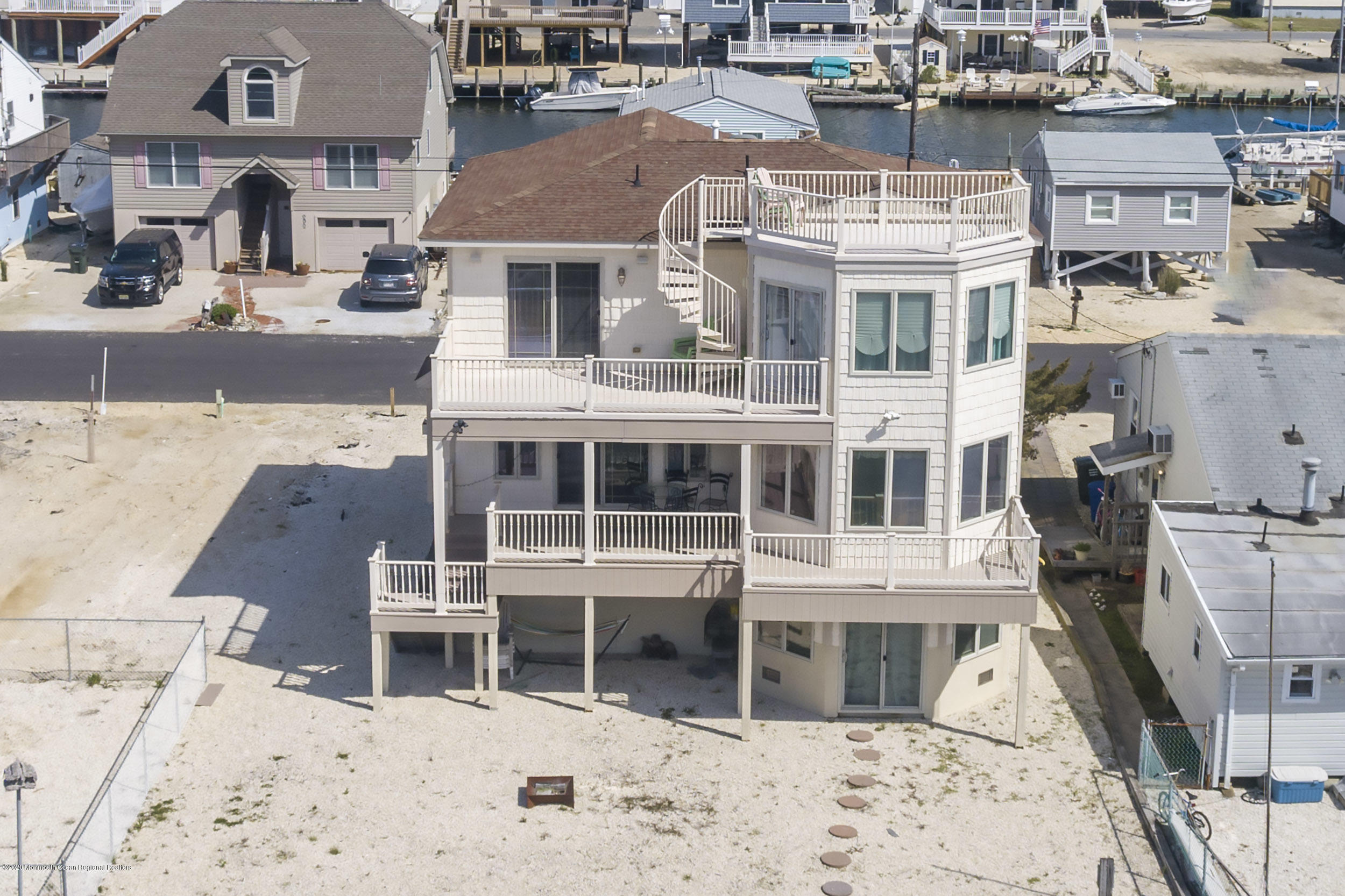 214 Heron Road Tuckerton, NJ 08087 - Photo 31 of 31 a view of a large building with a yard