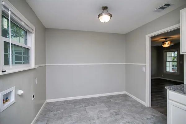 an empty room with windows