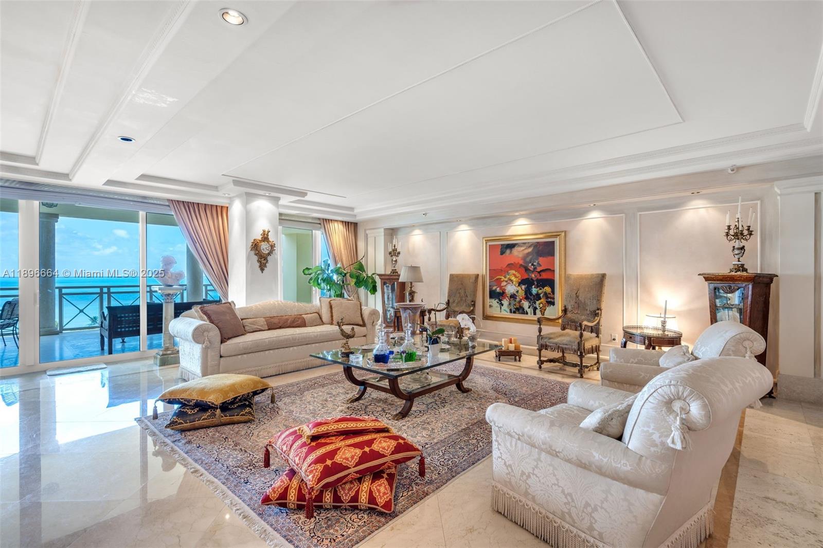 445 Grand Bay Drive, Unit 1001 Key Biscayne, FL 33149 - Photo 18 of 57 a living room with furniture and a large window