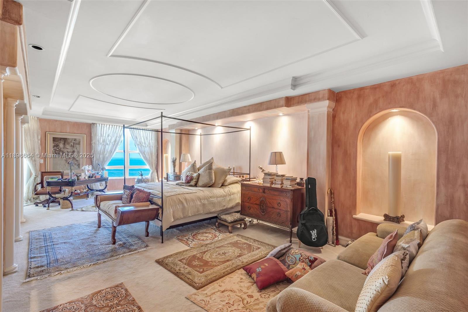 445 Grand Bay Drive, Unit 1001 Key Biscayne, FL 33149 - Photo 27 of 57 a living room with furniture and a large window