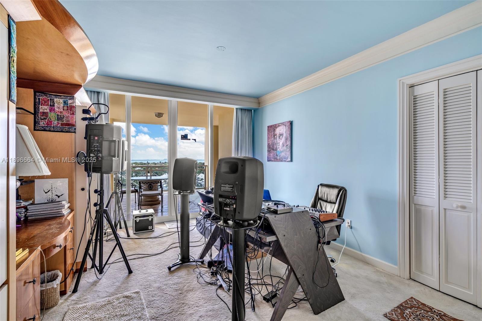 445 Grand Bay Drive, Unit 1001 Key Biscayne, FL 33149 - Photo 35 of 57 a view of a room with gym equipment