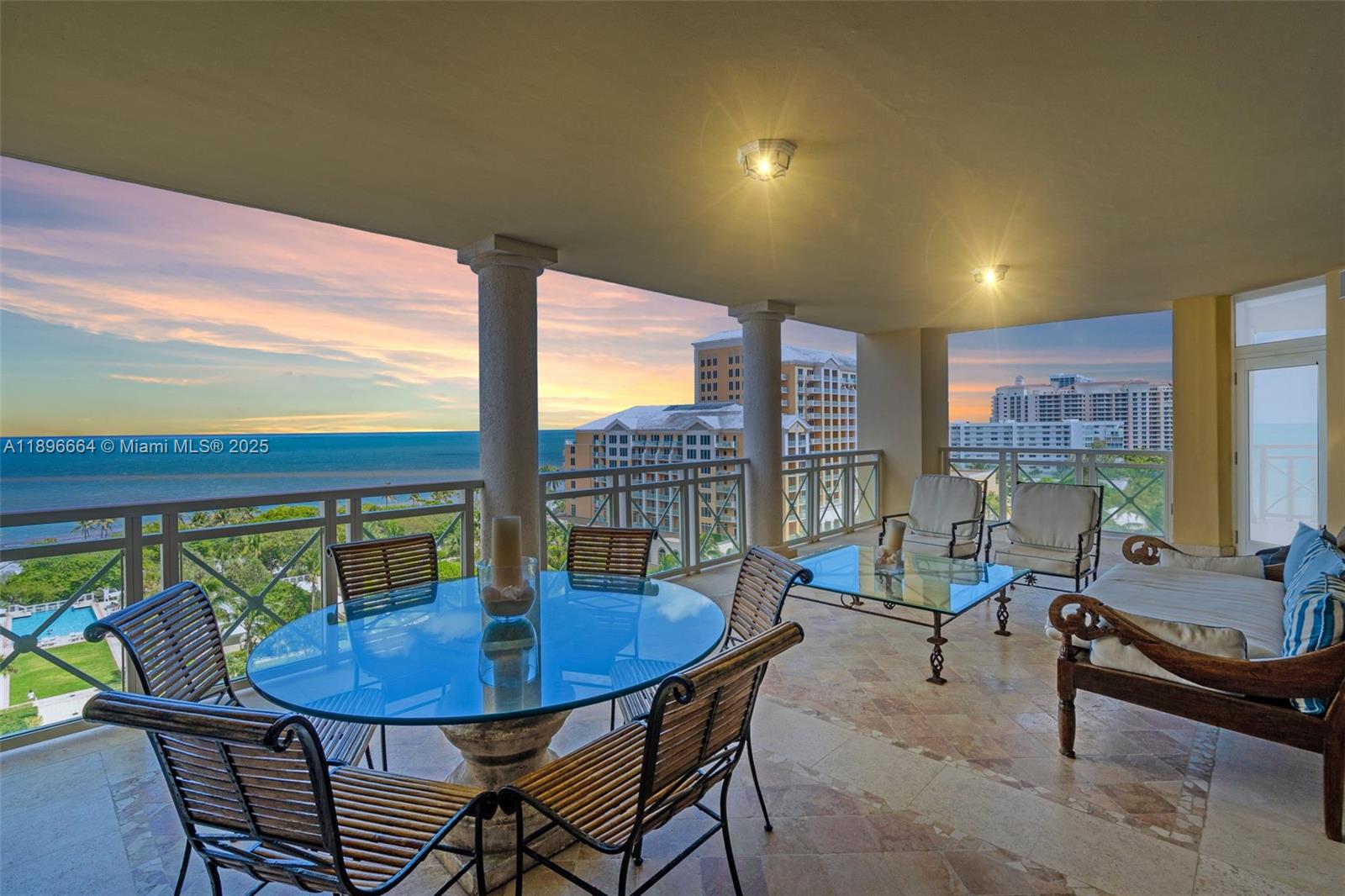 445 Grand Bay Drive, Unit 1001 Key Biscayne, FL 33149 - Photo 5 of 57 a view of a dining room with furniture window and outside view