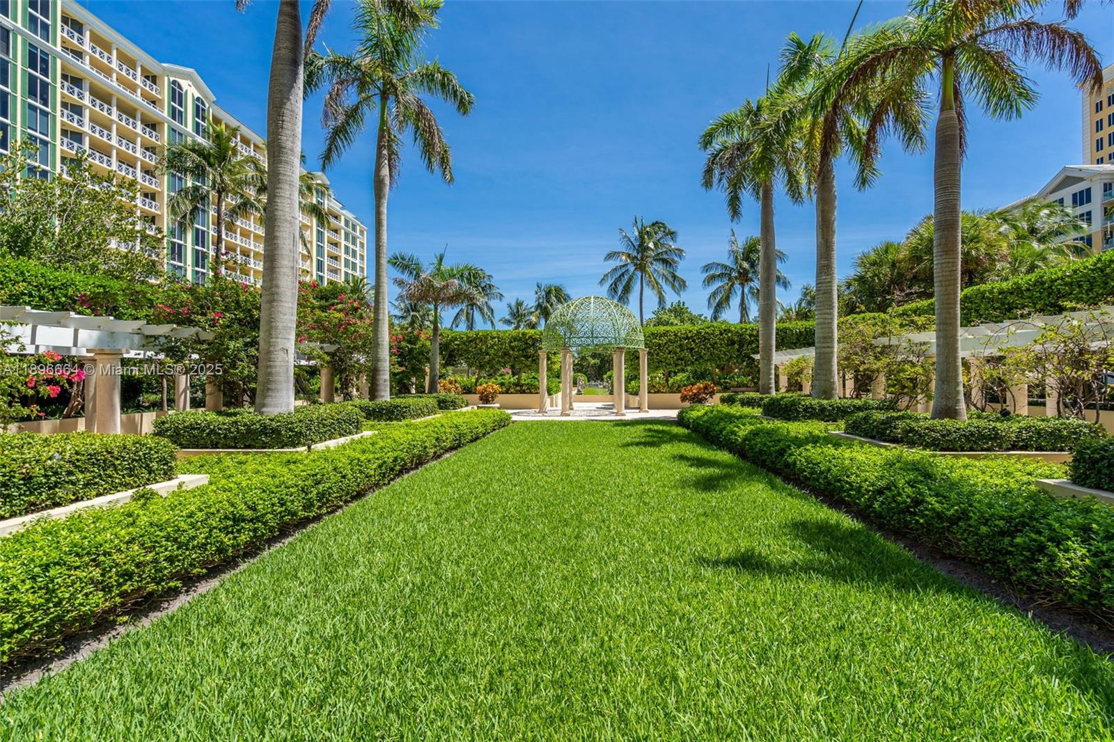 445 Grand Bay Drive, Unit 1001 Key Biscayne, FL 33149 - Photo 56 of 57 a view of a park with a palm trees