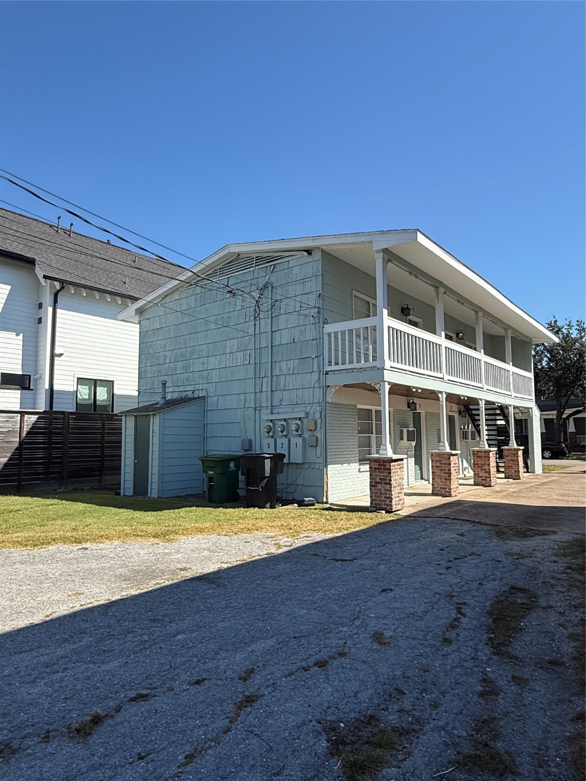 731 Columbia Street, Unit 1 Houston, TX 77007 - Photo 1 of 8 a view of a building with a swimming pool