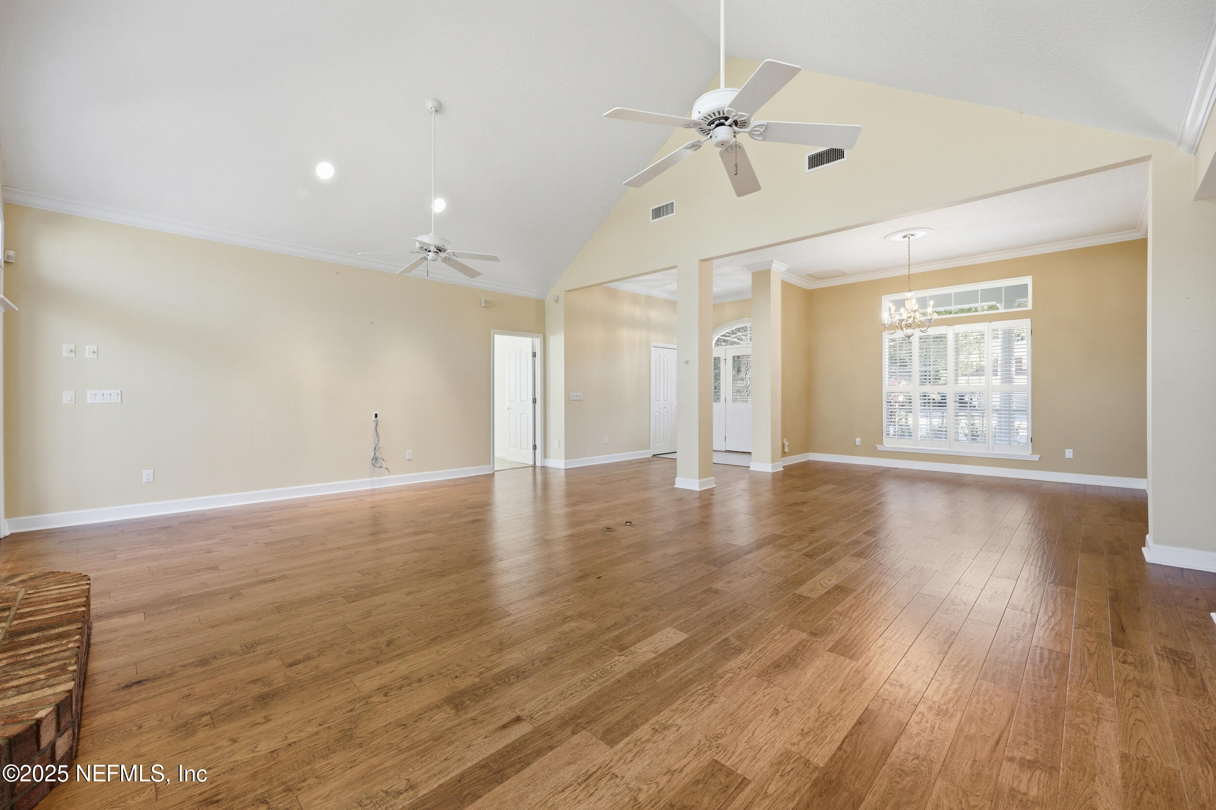 2332 Fiddlers Lane Atlantic Beach, FL 32233 - Photo 11 of 56 an empty room with wooden floor and windows