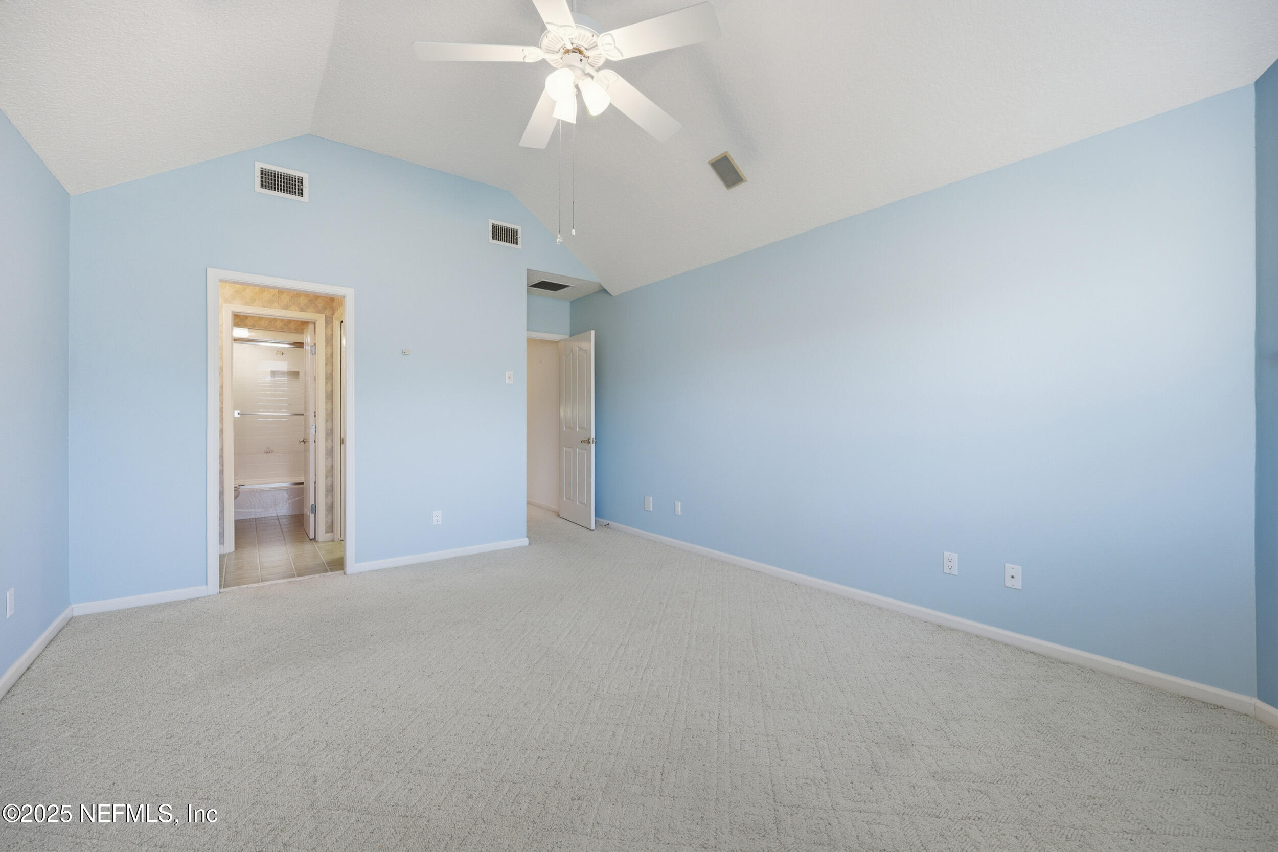 2332 Fiddlers Lane Atlantic Beach, FL 32233 - Photo 40 of 56 a view of an empty room and a ceiling fan