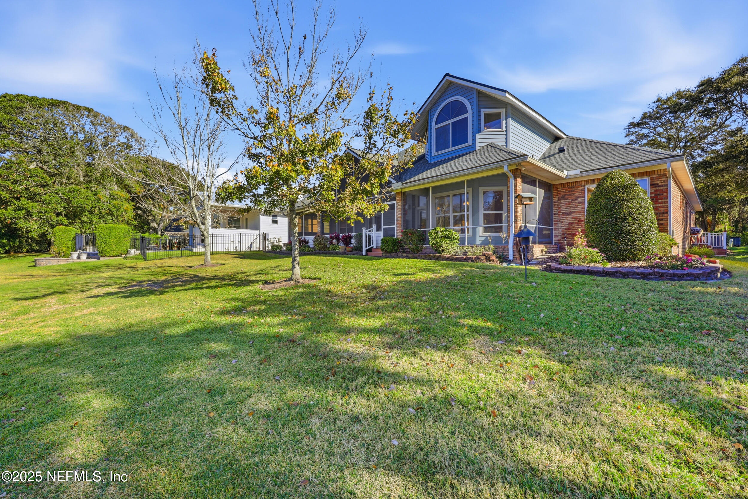 2332 Fiddlers Lane Atlantic Beach, FL 32233 - Photo 47 of 56 a front view of house with yard and green space