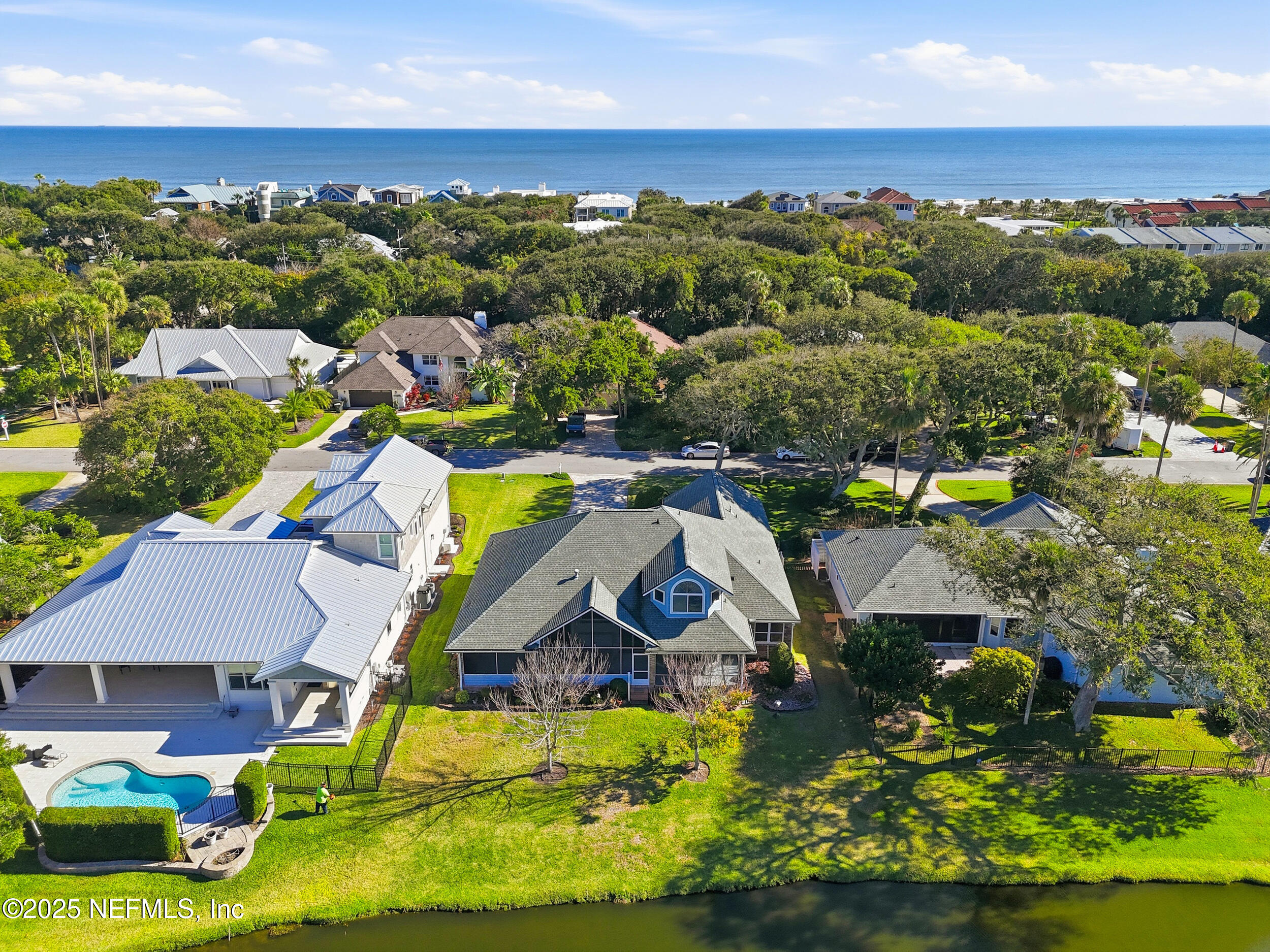 2332 Fiddlers Lane Atlantic Beach, FL 32233 - Photo 50 of 56 an aerial view of a house with a swimming pool yard and outdoor seating