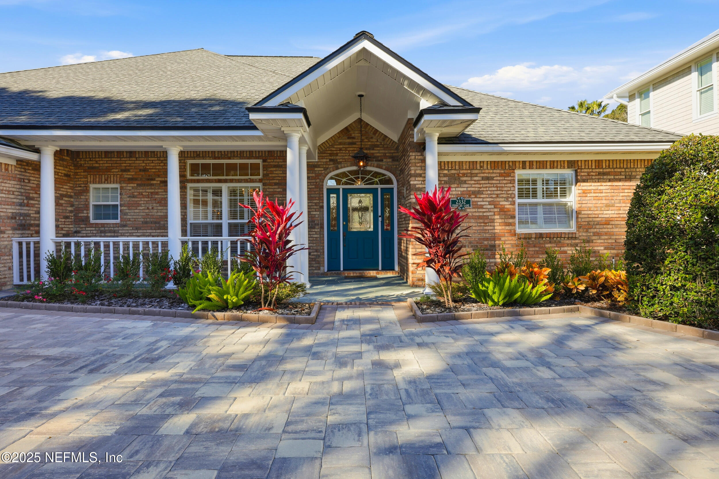 2332 Fiddlers Lane Atlantic Beach, FL 32233 - Photo 6 of 56 a front view of a house