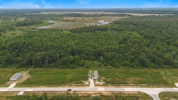 a view of a lake with a big yard