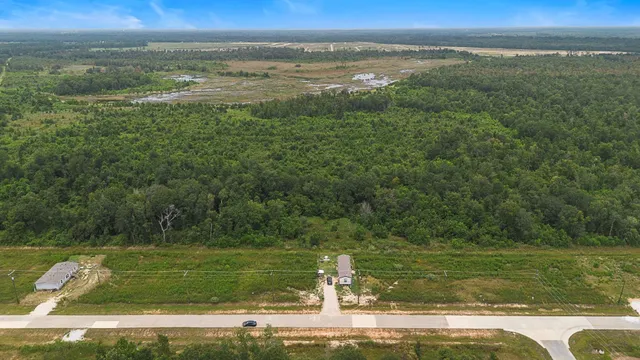 a view of a lake with a big yard