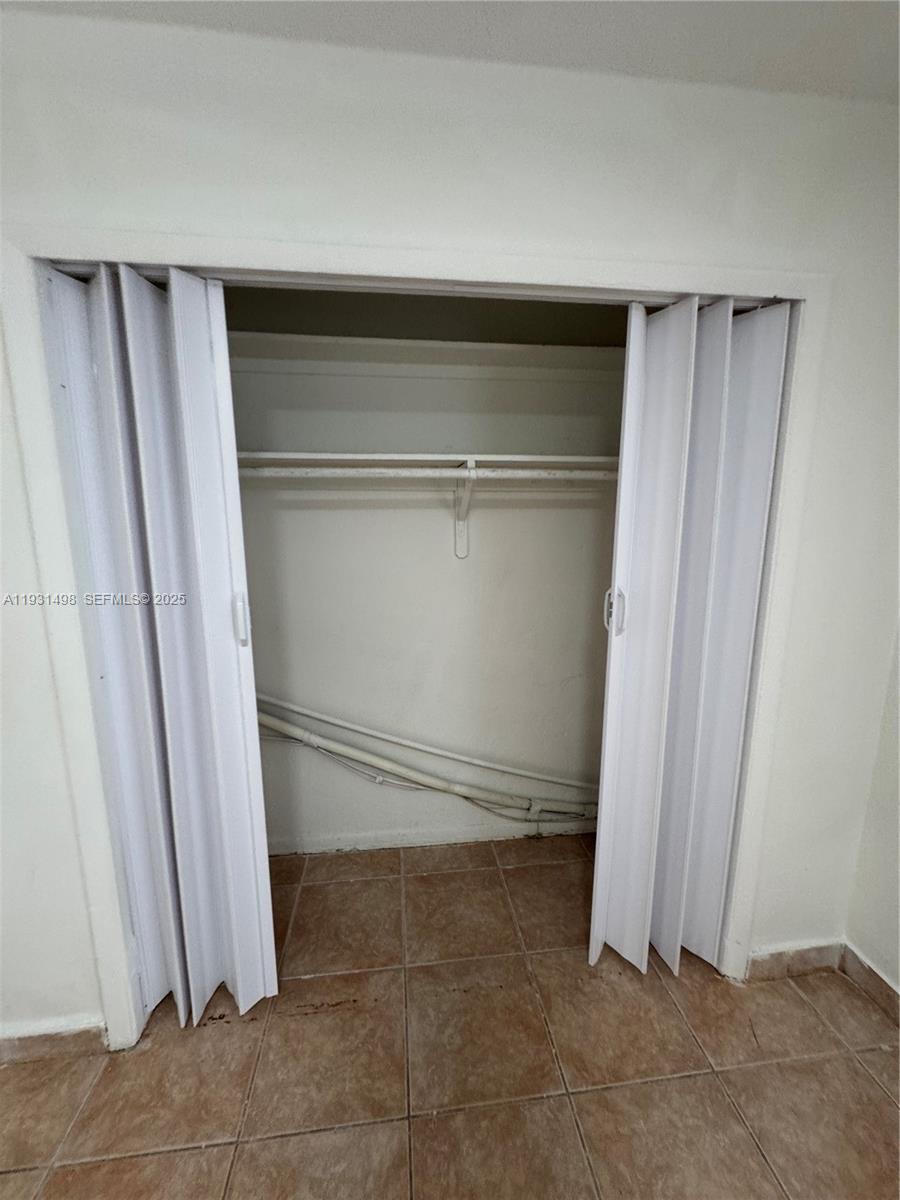 2146 Northwest 18th Terrace, Unit B Miami, FL 33125 - Photo 14 of 19 a view of closet