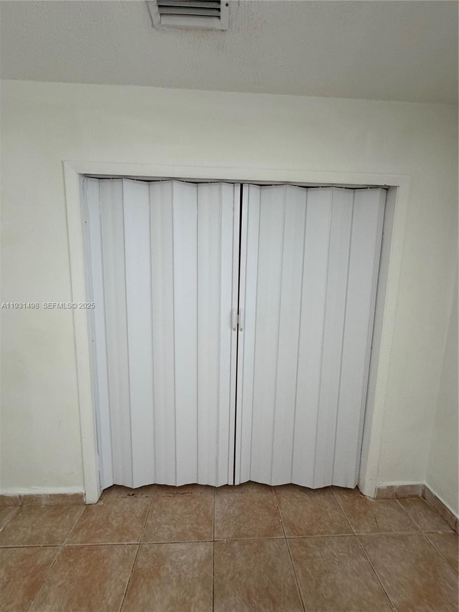 2146 Northwest 18th Terrace, Unit B Miami, FL 33125 - Photo 15 of 19 a view of wooden floor