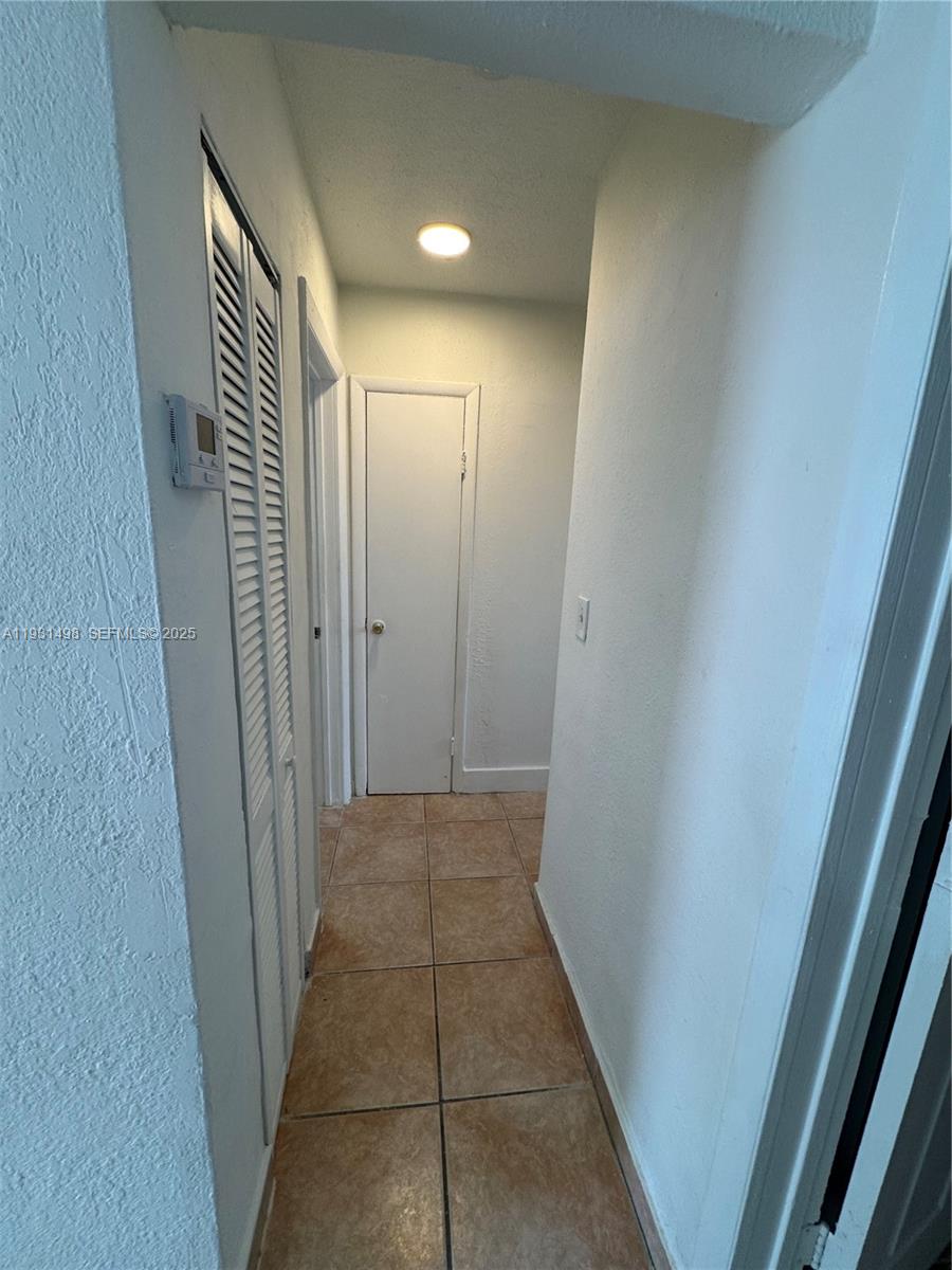 2146 Northwest 18th Terrace, Unit B Miami, FL 33125 - Photo 8 of 19 a view of hallway