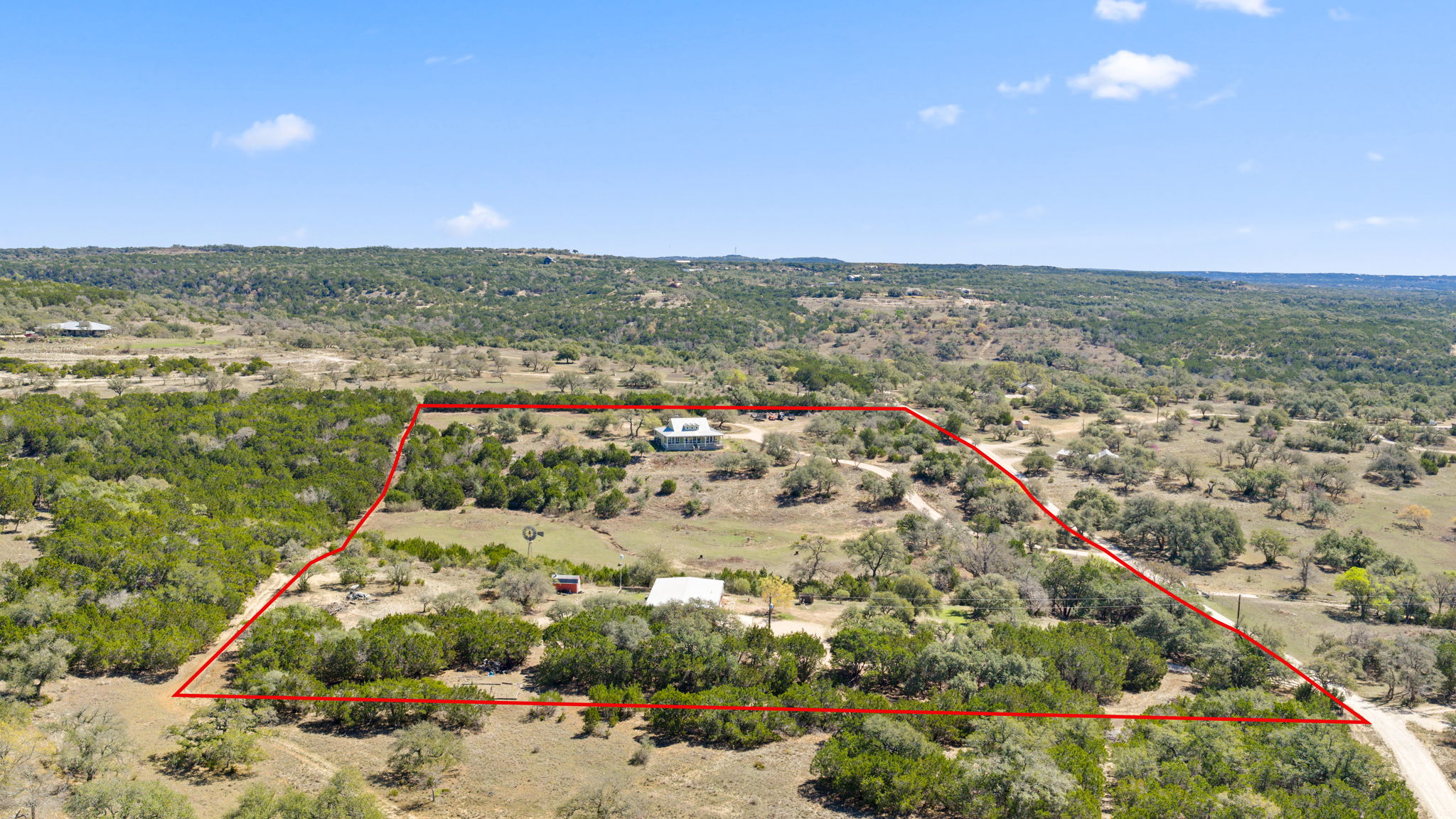 6350 Mt Sharp Road, Unit B Wimberley, TX 78676 - Photo 34 of 34 a view of a city with an ocean beach