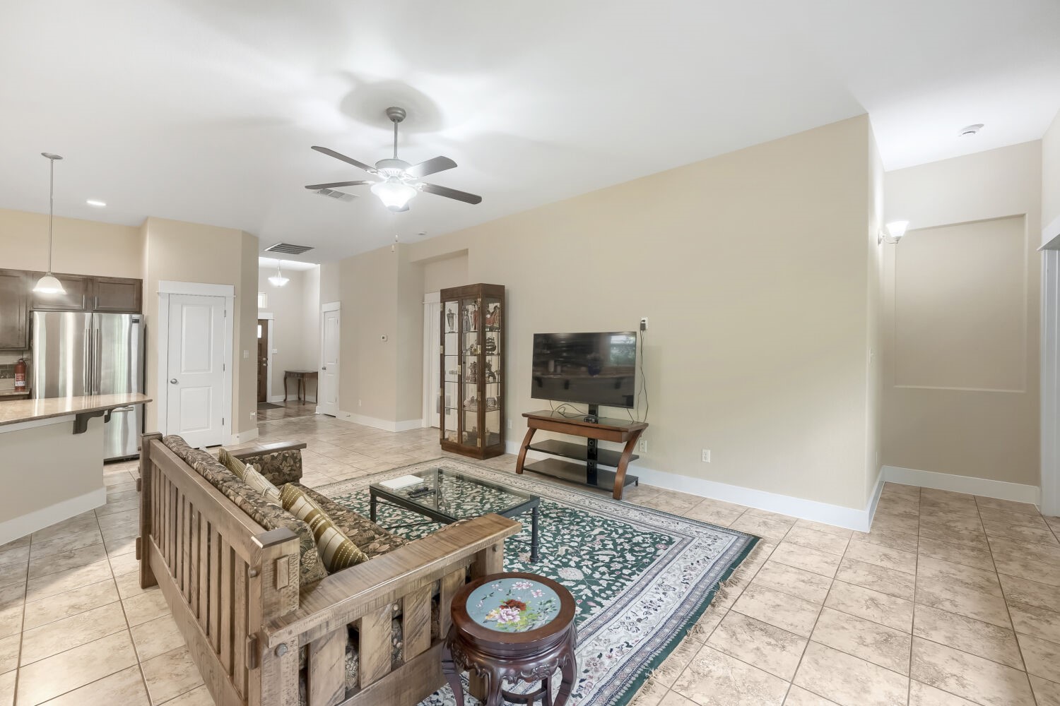 805 Waterfall Way Austin, TX 78753 - Photo 11 of 29 Living Area and hallway to Primary Bedroom