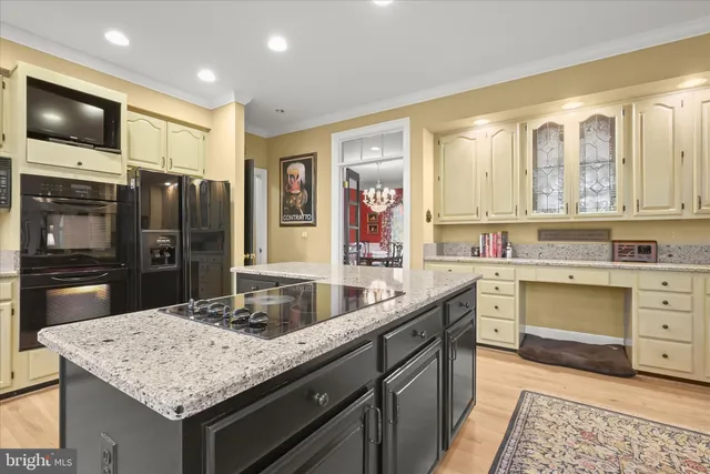 a living room with furniture a rug and a large window