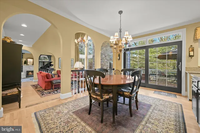 a bathroom with a sink mirror and toilet