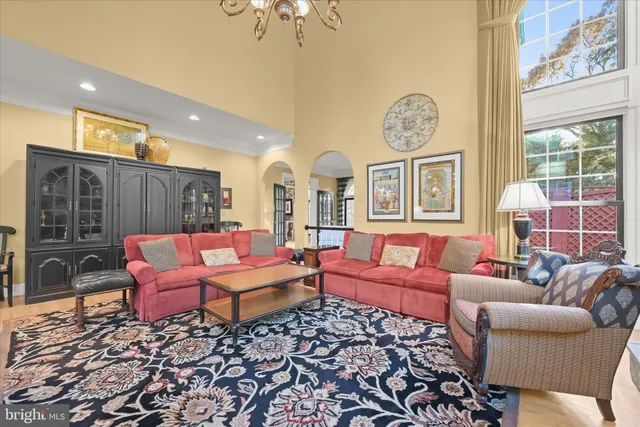a view of a chairs and table in the balcony