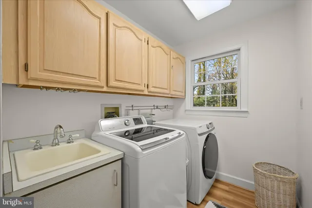 a view of a house with a yard porch and sitting area