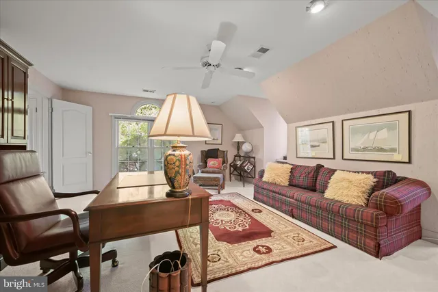 a view of a chairs and table on the wooden deck