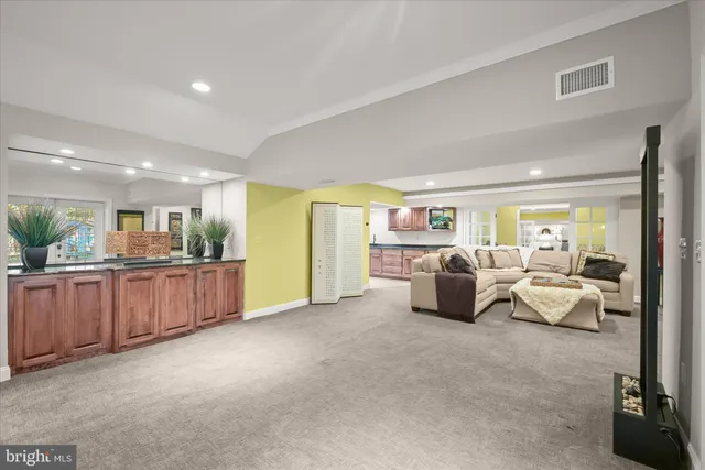 a view of house with yard and entertaining space