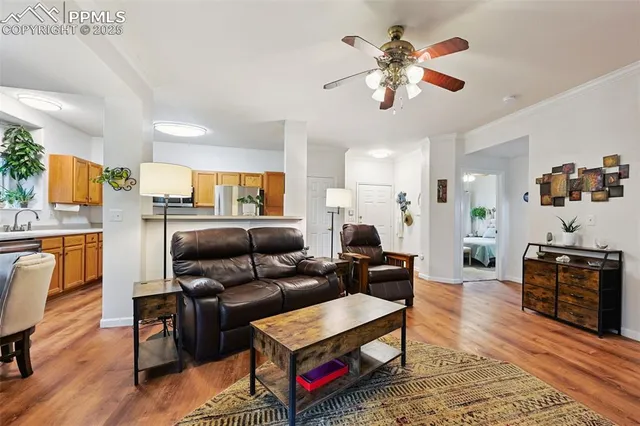 a living room with furniture fireplace and flat screen tv