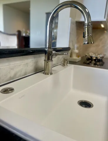 a bedroom with bed and window