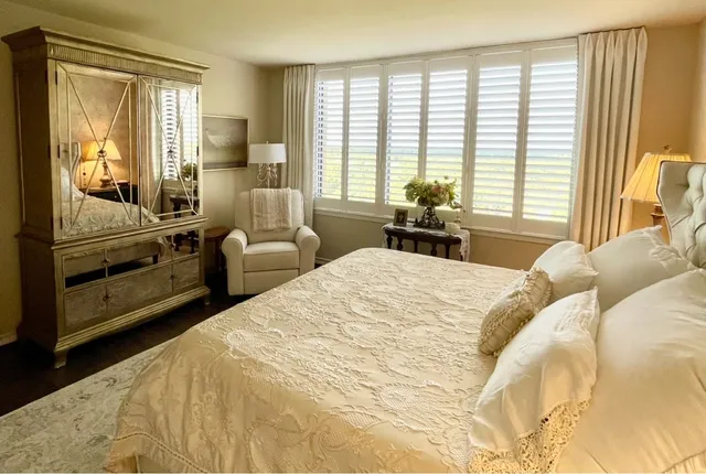 a bathroom with a sink vanity and mirror