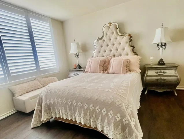 a view of bathroom with a toilet sink and mirror