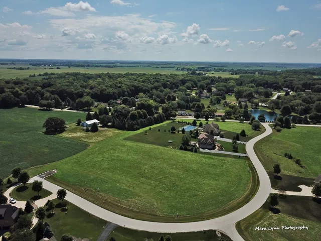 a view of a golf course with a swimming pool