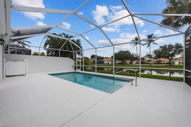 a view of a backyard with sitting area