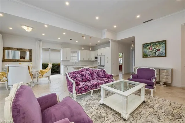 a living room with furniture and a rug
