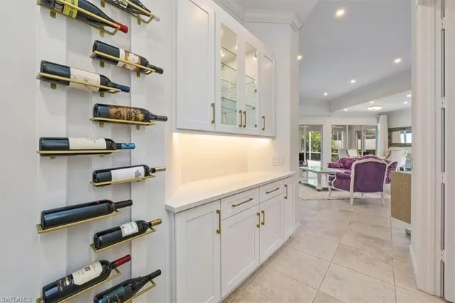a kitchen with cabinets and window