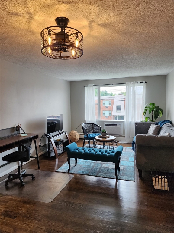 99 Cluff Crossing Road, Unit B12 Salem, NH 03079 - Photo 8 of 12 a living room with furniture
