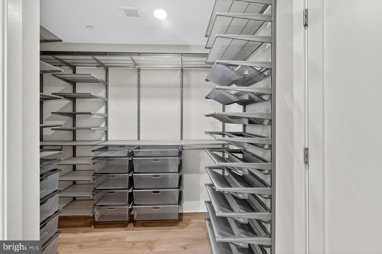 88 V Street Southwest, Unit 509 Washington, DC 20024 - Photo 28 of 35 a view of walk in closet with empty racks