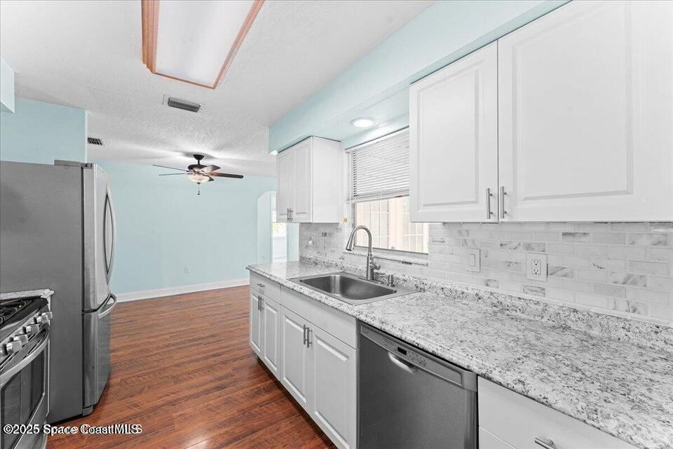 1527 Spruce Road Melbourne, FL 32935 - Photo 5 of 24 kitchen 2