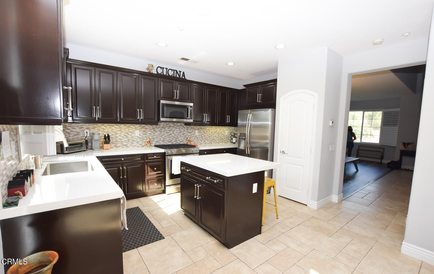 615 Halifax Lane Oxnard, CA 93035 - Photo 9 of 21 a kitchen with a cabinets and a stove